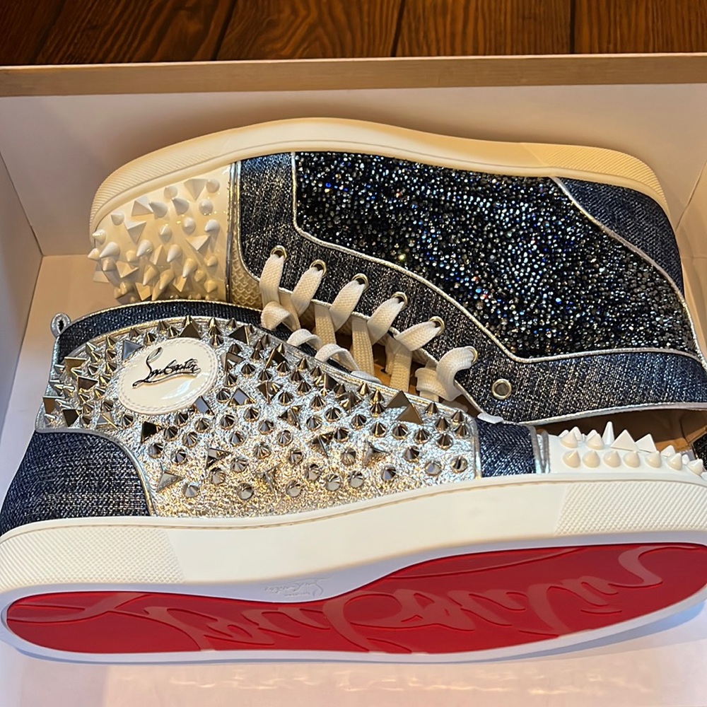 Christian Louboutin. European size 42.5 men sneaker. Box included. NEVER WORN.